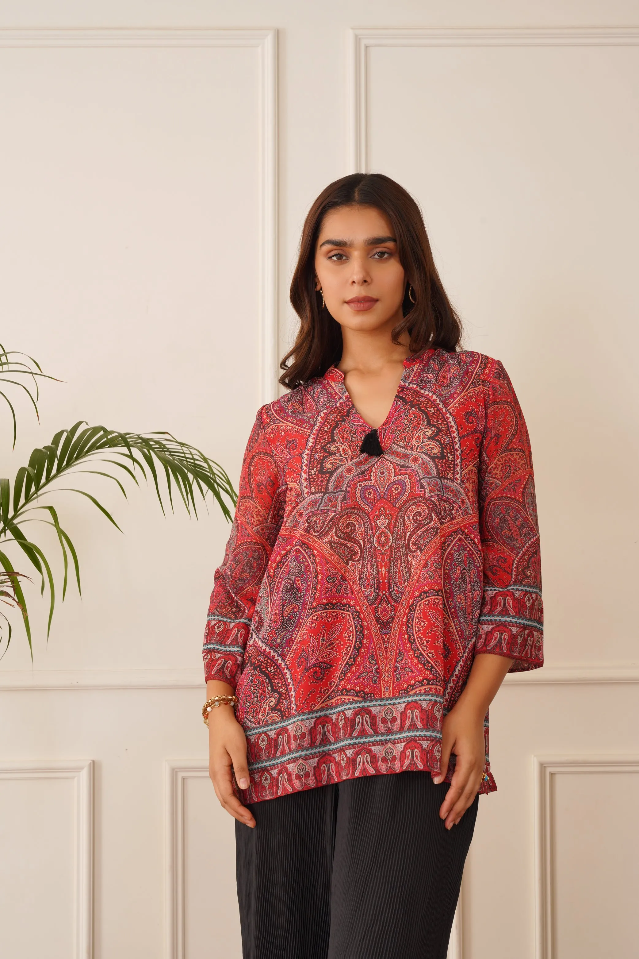Red Printed Top with Black Pleated Pants