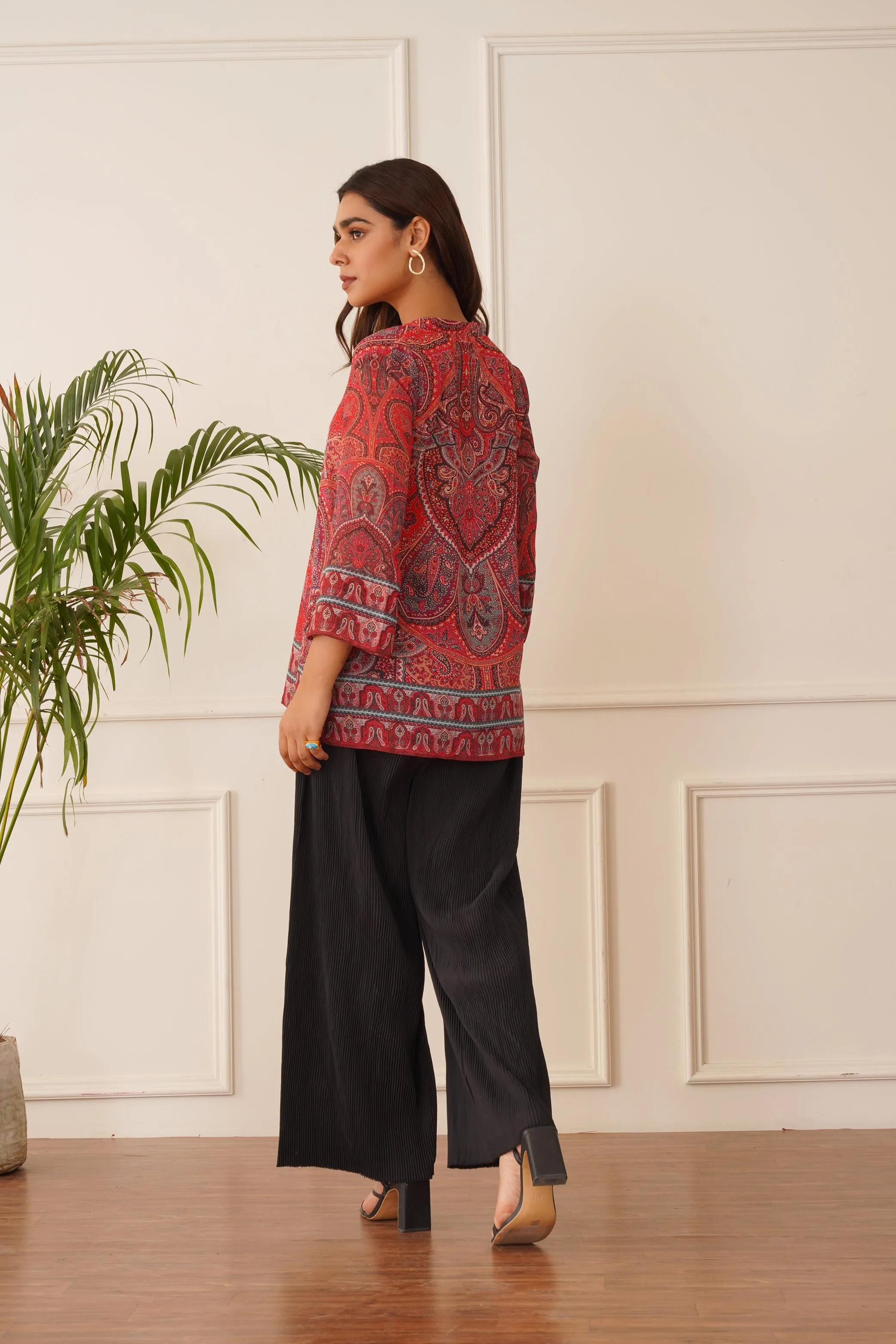 Red Printed Top with Black Pleated Pants
