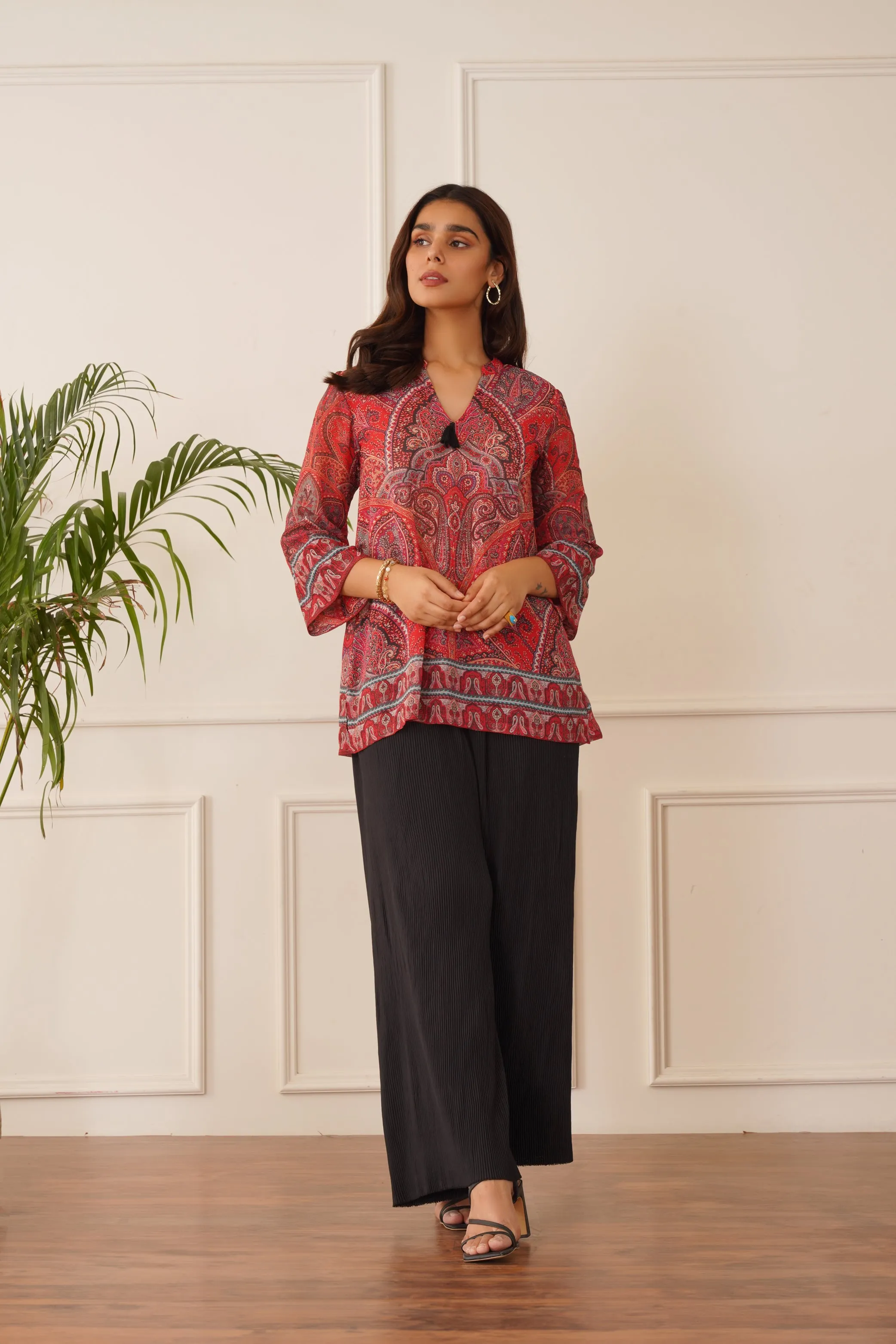 Red Printed Top with Black Pleated Pants
