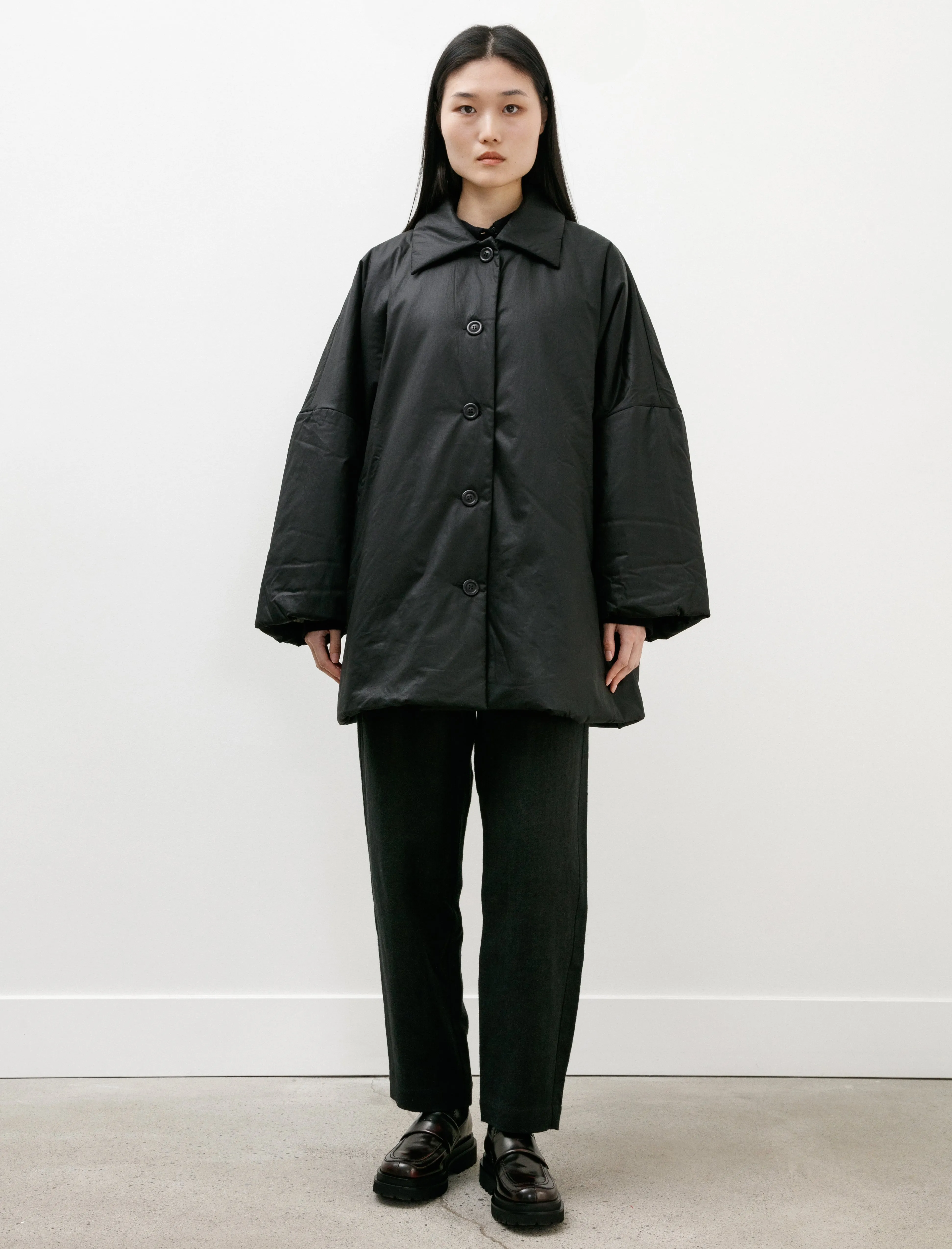 Triangle Coat Lacqed Black